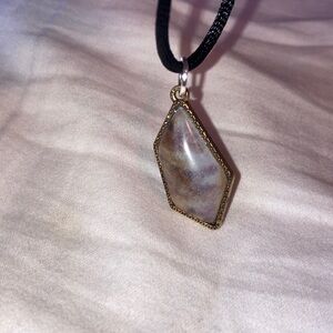 Elegant Gold and Silver Pendant Necklace